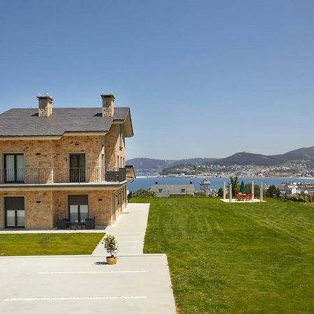Apartamentos Arumes Do Mar E Montana - مْبيفيرو المظهر الخارجي الصورة