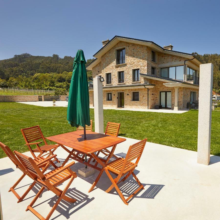 Apartamentos Arumes Do Mar E Montana - مْبيفيرو المظهر الخارجي الصورة